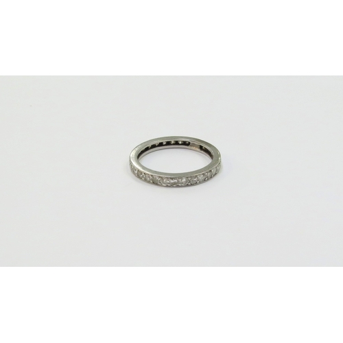 9096 - A diamond eternity ring, resized, unmarked Size N, 2.8g