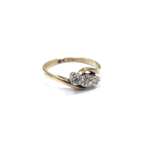 9296 - A three stone illusion set diamond ring, stamped 9ct/plat, repaired. Size P, 2.2g