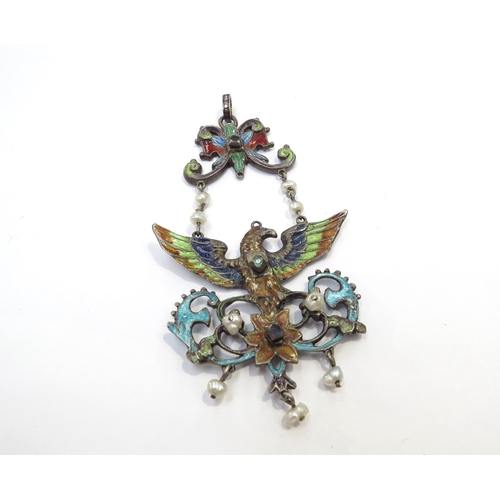 9393 - An Austro\Hungarian enamelled pendant of a bird with outstretched wings studded with pearls and gree... 