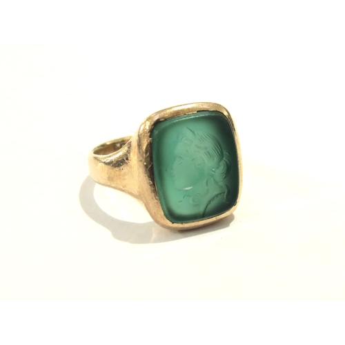 9017 - A 9ct gold Chester hallmarked intaglio ring depicting a females side profile. Size K, 4.2g