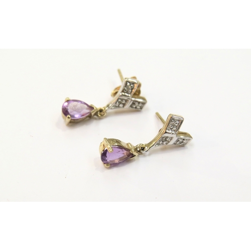 9273 - A pair of 9ct gold amethyst drop earrings with a diamond set 