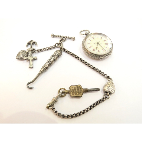 9286 - A silver fob watch with chain and charms, boxed