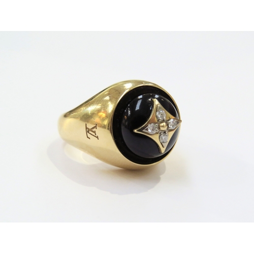 9063 - LOUIS VUITTON; An 18ct yellow gold Blossom Signet Ring, Onyx and Diamond set domed cabochon. Size J/... 