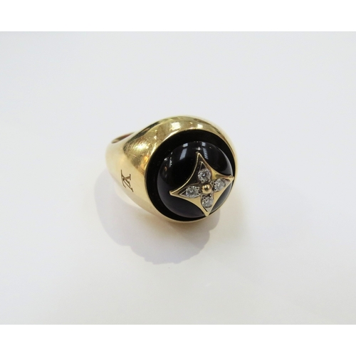 9063 - LOUIS VUITTON; An 18ct yellow gold Blossom Signet Ring, Onyx and Diamond set domed cabochon. Size J/... 