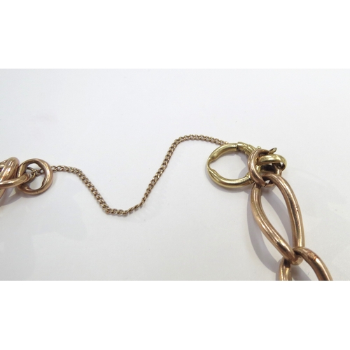 9174 - A 9ct rose gold bracelet possibly made from a watch chain with a yellow gold clasp, 19cm long, 24.5g