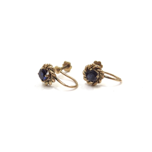 9319 - A pair of gold screw back earrings stamped 9ct set with sapphires, 3.4g