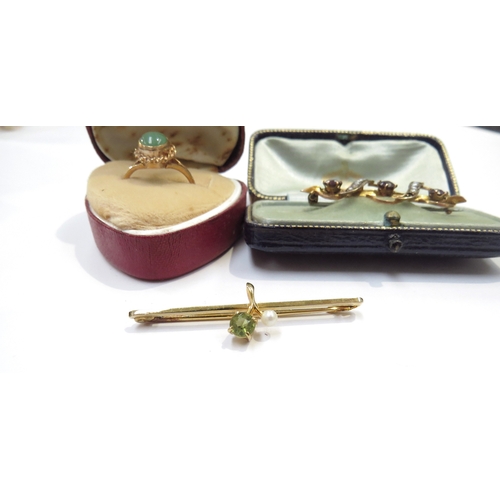 9315 - Two gold bar brooches stamped 9ct and a 9ct gold jade set ring, 6.8g total