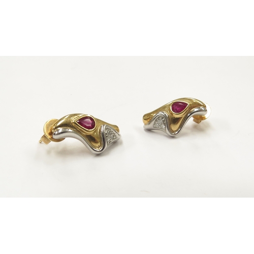 9062 - A pair of platinum and 18ct gold ruby and diamond earrings, 5.8g