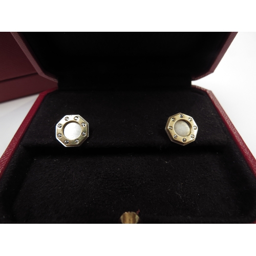 9064 - CARTIER; A pair of 18ct gold Santos Dumont stud earrings in original box and outer, 4.9g