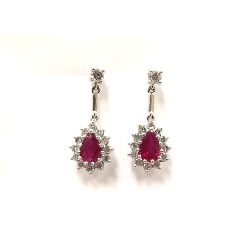 9026 - A pair of 18ct white gold ruby and diamond drop earrings, 2.5cm drop, 5.4g