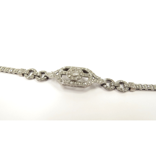 9022 - An Art Deco diamond bracelet, probably converted from a cocktail watch, 16.5cm long, 12.7g