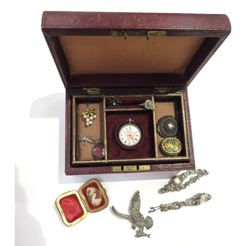 9425 - A jewellery box with contents including marcasite cocktail watches, brooch as a bird, ring etc