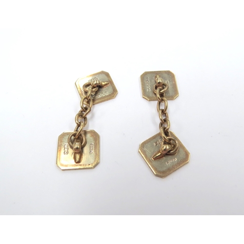 9382 - A pair of 9ct gold cufflinks of canted square form, engine turned decoration, 5.6g