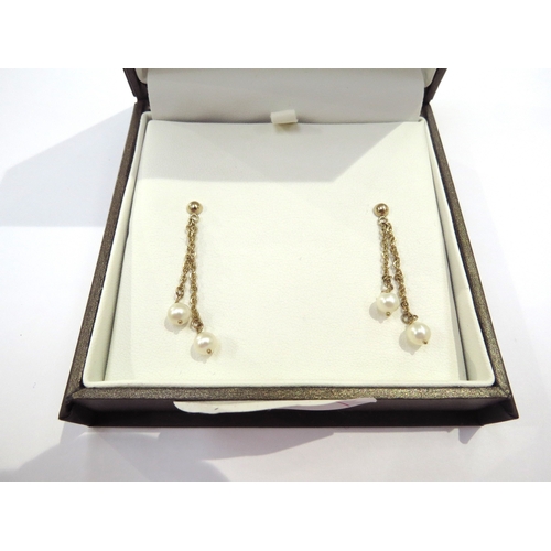 9423 - A pair of 9ct gold double drop earrings with pearls to end, 4cm long, 2g, in original box from Pink ... 