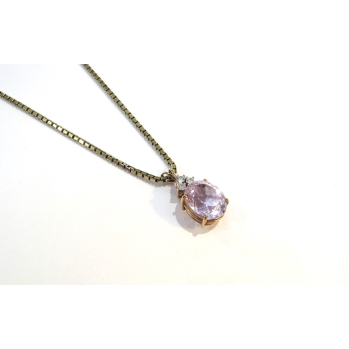 9121 - A 9ct gold box chain necklace, 60cm long hung with three stone diamond and facet cut pink kunzite pe... 