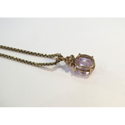 9121 - A 9ct gold box chain necklace, 60cm long hung with three stone diamond and facet cut pink kunzite pe... 