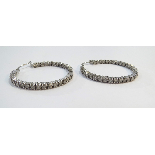 9182 - A pair of 18ct white gold diamond hoop earrings, 3.5cm diameter, 11.7g