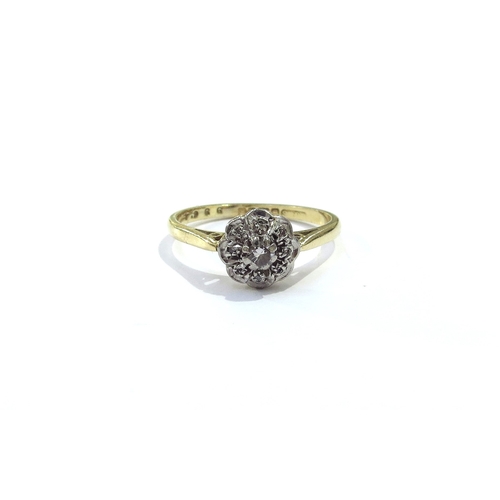 9167 - An 18ct gold diamond cluster ring. Size O, 2.8g