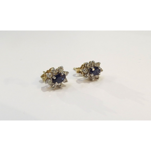 9165 - A pair of 18ct gold sapphire and diamond cluster earrings, 2.5g