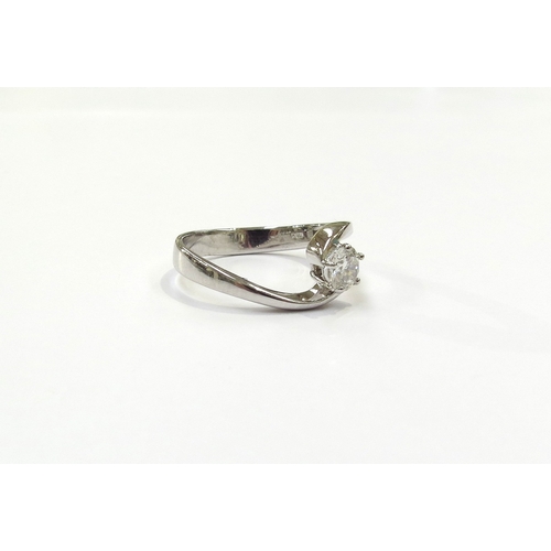 9043 - An 18ct white gold diamond solitaire in crossover setting, 0.50ct approx. Size O, 3.5g