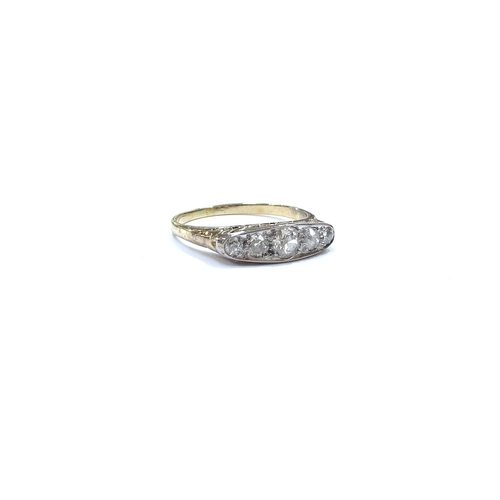 9020 - A graduated five stone diamond ring, unmarked gold. Size N/O, 3.2g