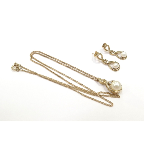 9294 - A pair of 9ct gold pearl drop earrings with a pearl and diamond pendant hung on 9ct gold chain, 46cm... 