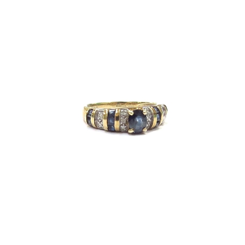 9078 - A 14ct gold sapphire and diamond dress ring. Size J, 2.7g