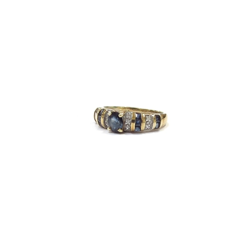 9078 - A 14ct gold sapphire and diamond dress ring. Size J, 2.7g