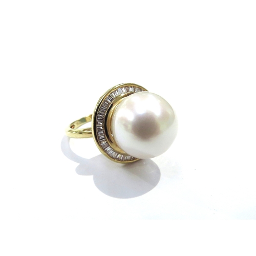 9079 - An 18ct gold Iliana pearl and diamond ring the centre pearl 12cm diameter framed by diamonds. Size M... 