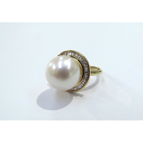 9079 - An 18ct gold Iliana pearl and diamond ring the centre pearl 12cm diameter framed by diamonds. Size M... 