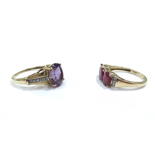 9261 - A 9ct gold three stone ruby ring with diamond set shoulders, size P/Q, and a gold ring with amethyst... 