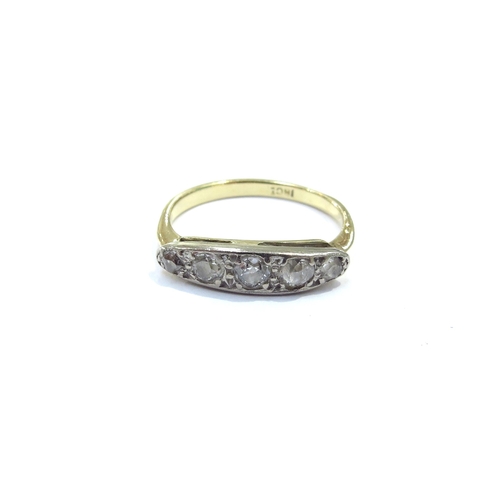 9088 - A graduated five stone diamond ring, stamped 18ct. Size L, 2.8g