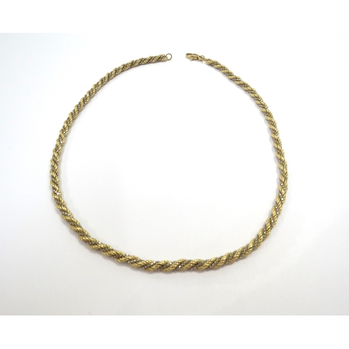 9374 - A two tone rope twist necklace, stamped 750, 41cm long, 20g