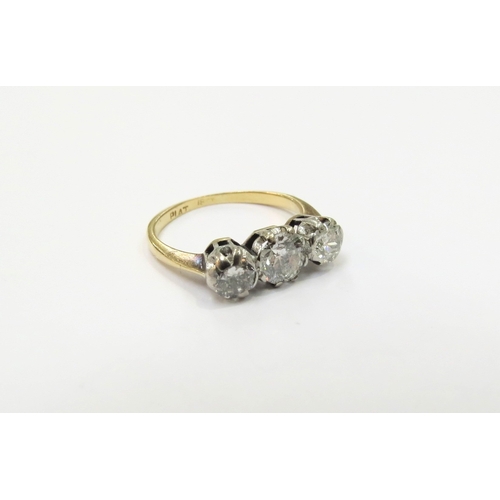 9153 - An 18ct gold platinum set three stone diamond ring, 0.90ct total approx. Size I, 2.5g