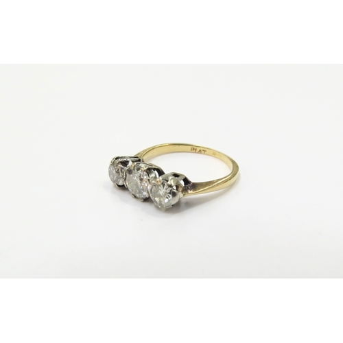 9153 - An 18ct gold platinum set three stone diamond ring, 0.90ct total approx. Size I, 2.5g