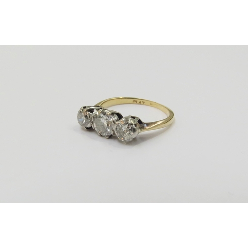 9153 - An 18ct gold platinum set three stone diamond ring, 0.90ct total approx. Size I, 2.5g