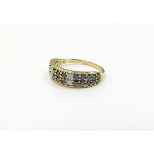 9282 - A 9ct gold Thomas Rae blue and white diamond ring. Size U, 3.6g