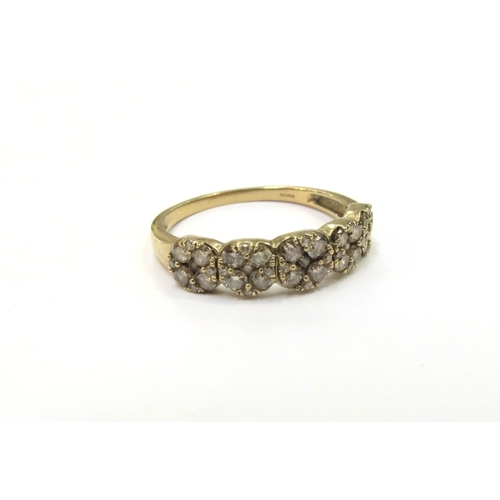 9335 - A 9ct gold Thomas Rae Champagne diamond ring. Size U, 2.7g