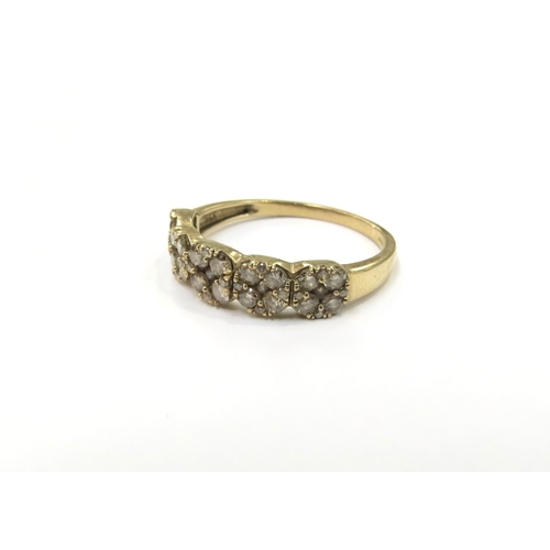 9335 - A 9ct gold Thomas Rae Champagne diamond ring. Size U, 2.7g