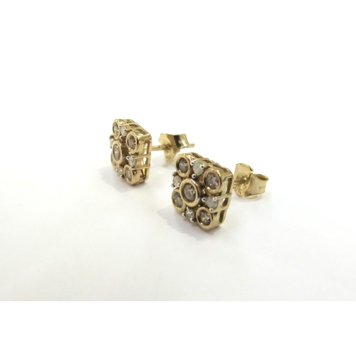 9244 - A pair of 9ct gold Champagne and white diamond cluster earrings, 1.9g