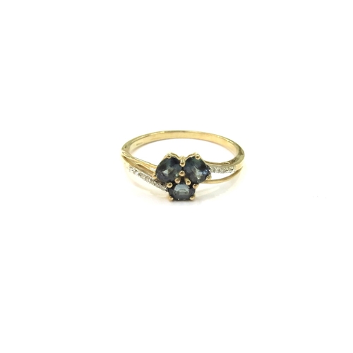 9249 - A 9ct gold Nigerian Blue sapphire and diamond ring. Size U, 2.2g