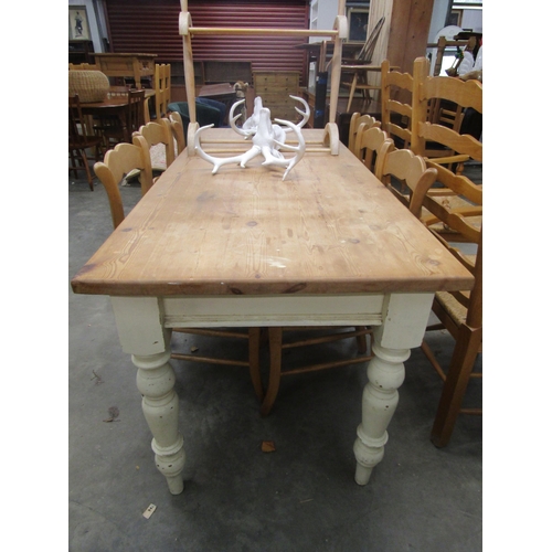 1089 - A Victorian style pine scrub top table with single end cutlery drawer over turned and tapering legs,... 