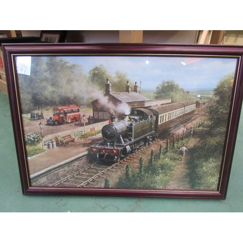 8001 - A framed and glazed print of a Great Western Locomotive in station, 83x 58cm