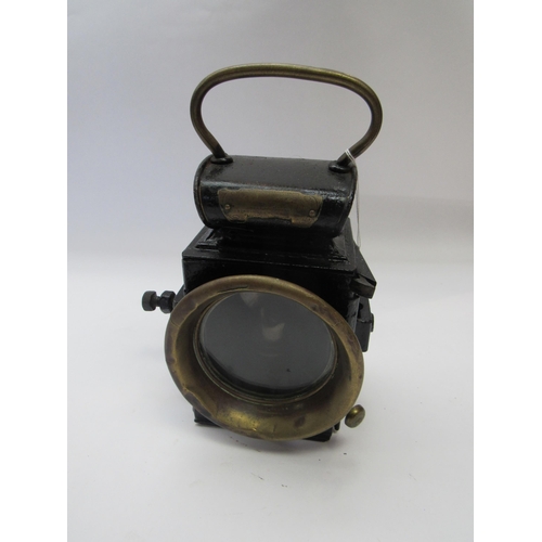 8022 - A black painted traction engine headlamp with interior