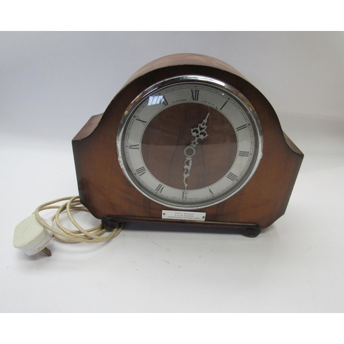 8028 - A walnut presentation Mantle clock by The Alexander Clarke Co. inscribed 