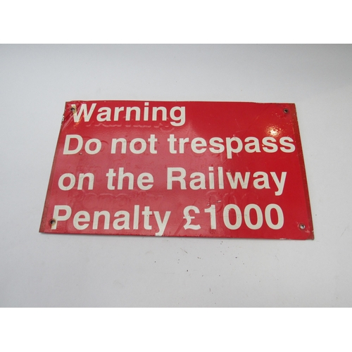 8047 - An tin sign - Warning not to Trespass, 35cm x 20cm