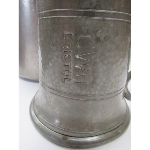 8056 - A cast handled lidded pot, stamped GWR Hotels to the side and GWR to the lid and similar tankard, al... 