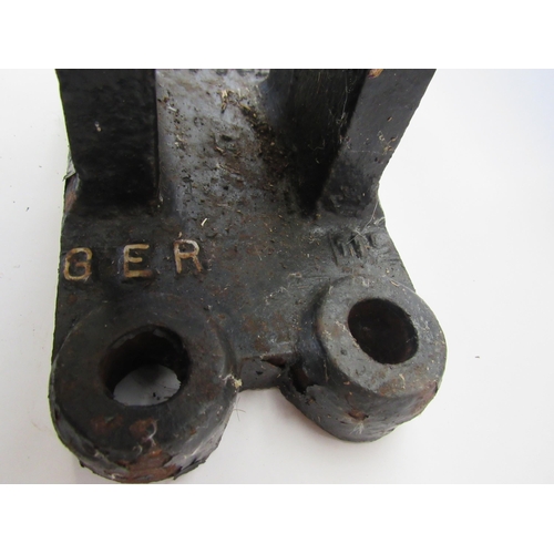 8065 - A cast iron GER rail chair dated 1887 and a similar GER signal lineside wire guide wheel a/f