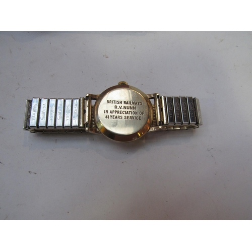 8182 - A 9ct gold cased Smiths wristwatch that was presented to Mr R.V Nunn who was a Leading Goods Porter ... 