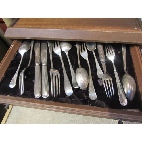 8199 - A mahogany cased six drawer cutlery storage unit containing silver plated examples from various comp... 